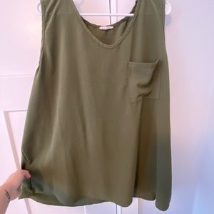 This tank pairs great on its own or with a cardigan!